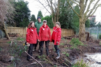 Naomi, Katie and Jess from the education team with woodlands officer Nick, busy preparing the outdoor classroom at The Canons CE Primary in Bedworth.