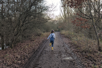 Girl running in wellies at Brandon Marsh 2019 Louise Barrack