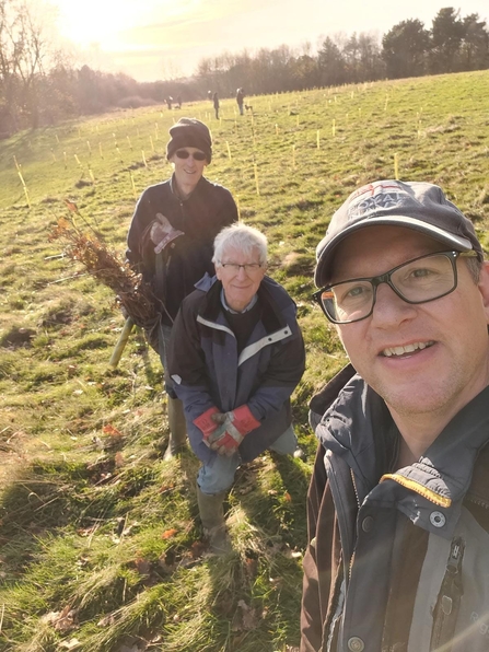 Planting trees as part of habitat creation on Newbold Comyn