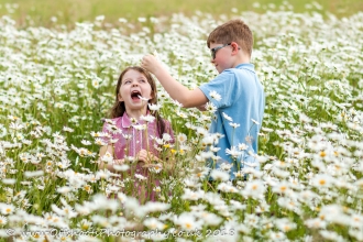 Children in meadow flowers Credit Vicky Page / Offshoots Photography