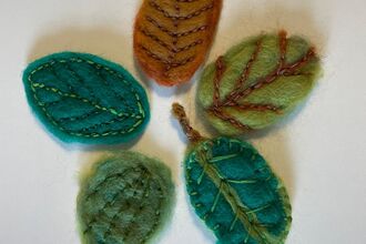 Wet felted leaves of various Autumn colors 