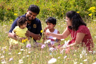 Family in a wildflower meadow. Jon Hawkins/Surrey Hills Photography