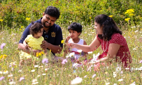 Family in a wildflower meadow. Jon Hawkins/Surrey Hills Photography