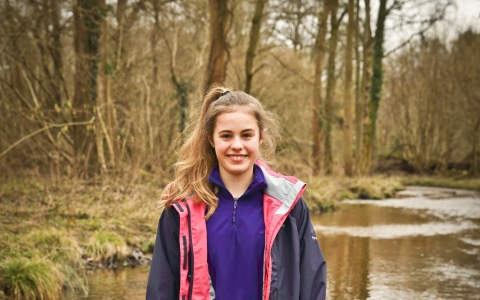 Issy standing in a river