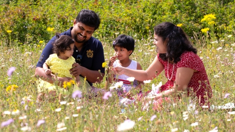 Family in a wildflower meadow. Jon Hawkins/Surrey Hills Photography