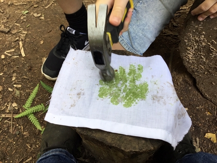 Hapa Zome hammering to create a fern leaf print