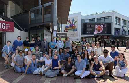 Group photo of salsa society, mayors and warwickshire wildlife staff on the piazza