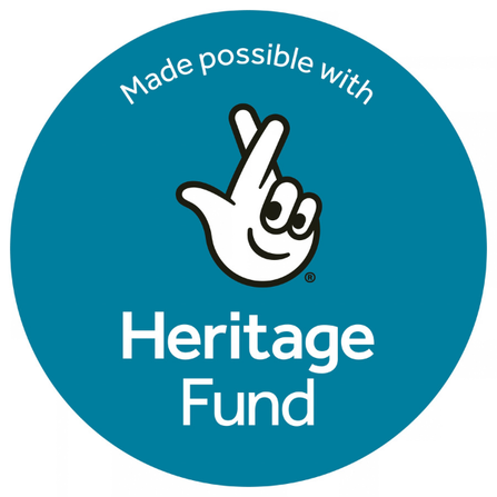 national lottery heritage fund logo "made possible with heritage fund" and a graphic of a white hand with black outline and 2 fingers crossed