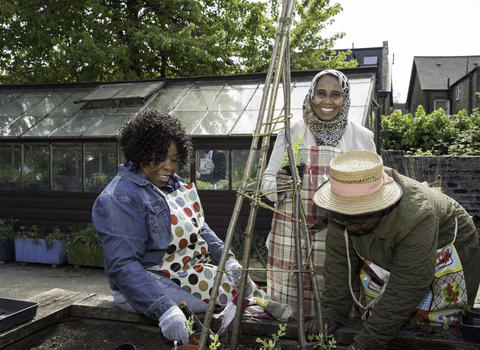 Photo of people gardening