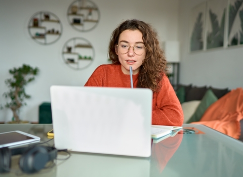 A woman using a laptop