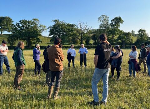 A group of farmers and landowners out on a walk with the Farm and Wildlife Advice Service from Warwickshire Wildlife Trust