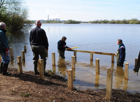 Volunteers building pond dipping deck