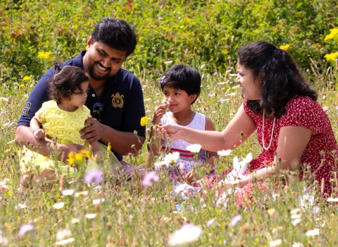 Family in a wildflower meadow. Jon Hawkins/Surrey Hills Photography